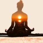a woman practicing mediation with yoga