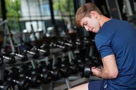 A man using dumbbells