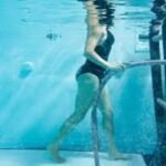waling on a treadmill in a pool