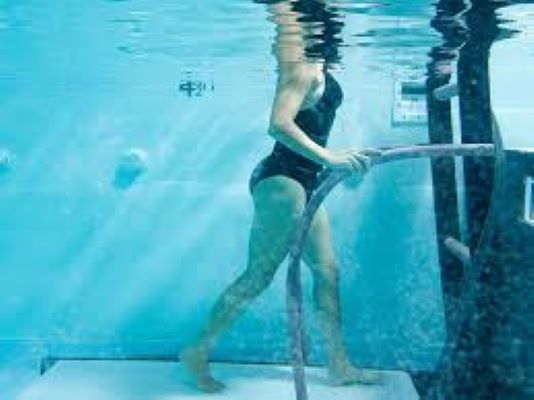 waling on a treadmill in a pool