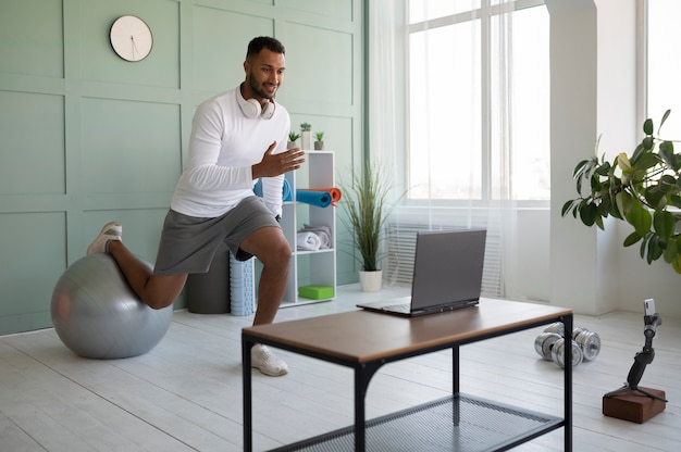 a man doing an exercise while working at home