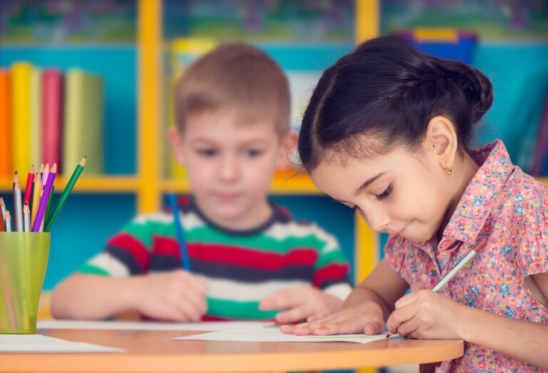 Two children at a desk