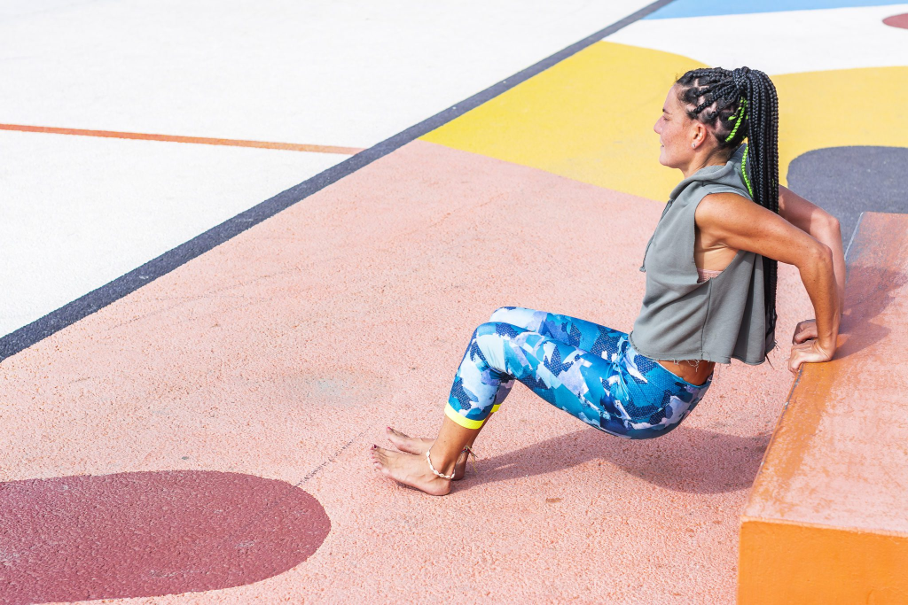 A woman doing dips