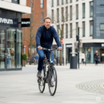 A man riding a bike.