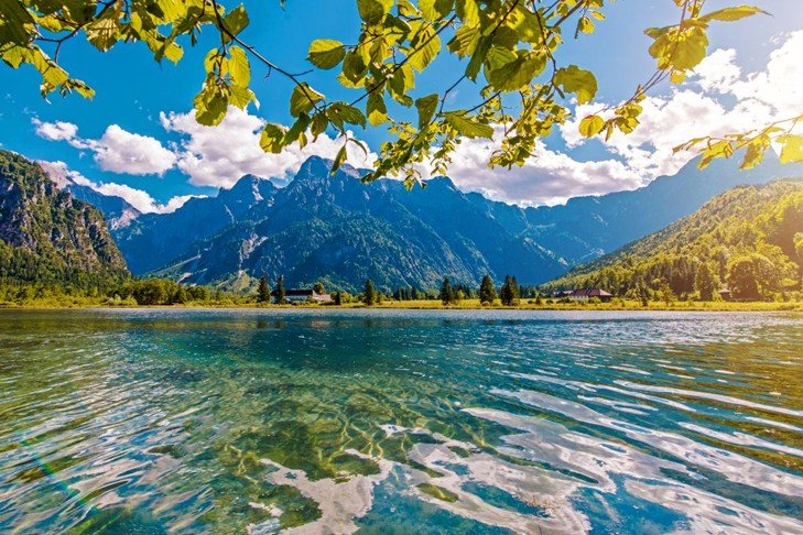 An image of a lake with a mountain in the background.
