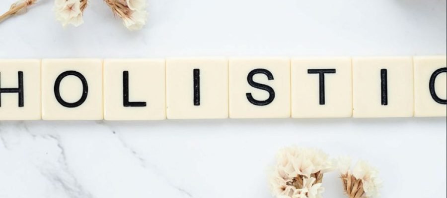 word tiles spelling holistic