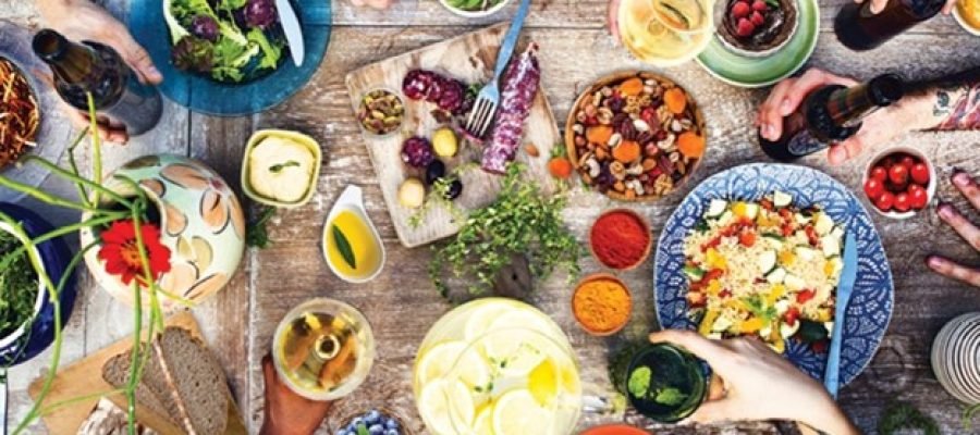 people around a table for a holiday meal