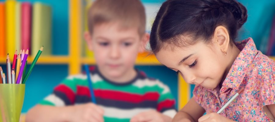 Two children at a desk