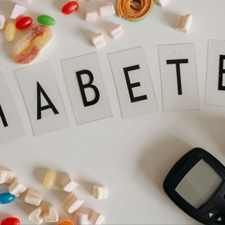 An image of diabetes with medication and suppplies